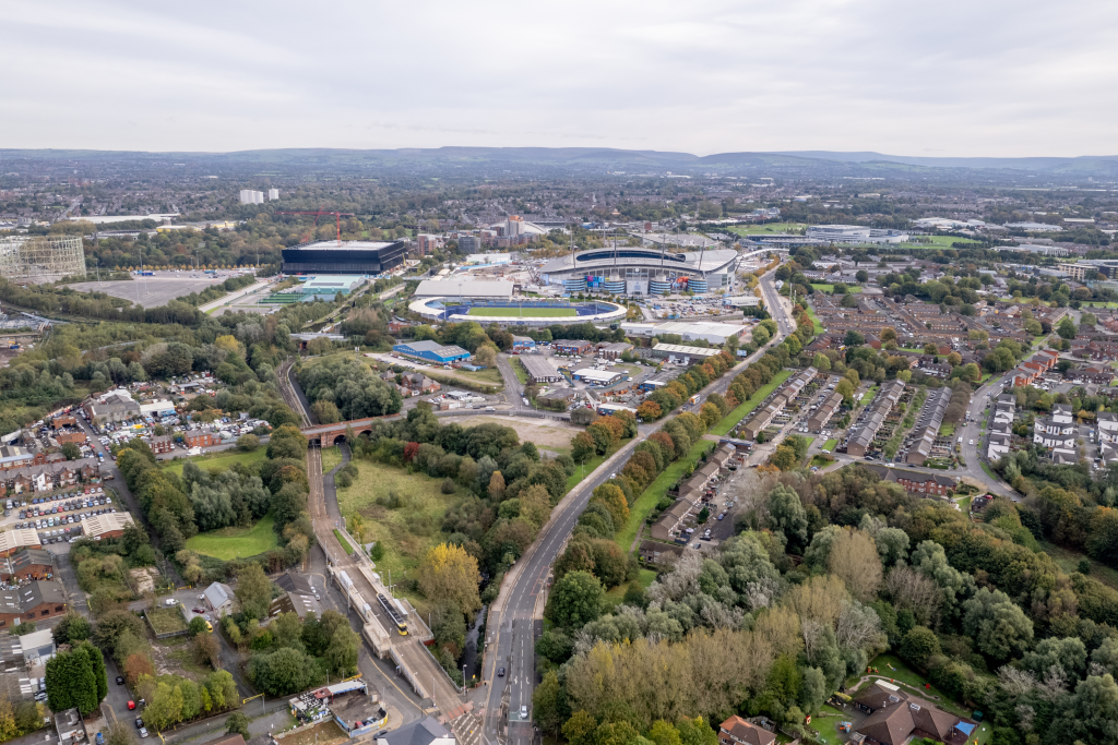 Holt-Town-Aerial-credit-Manchester-City-Council-crop-etihad-1600x1067.png